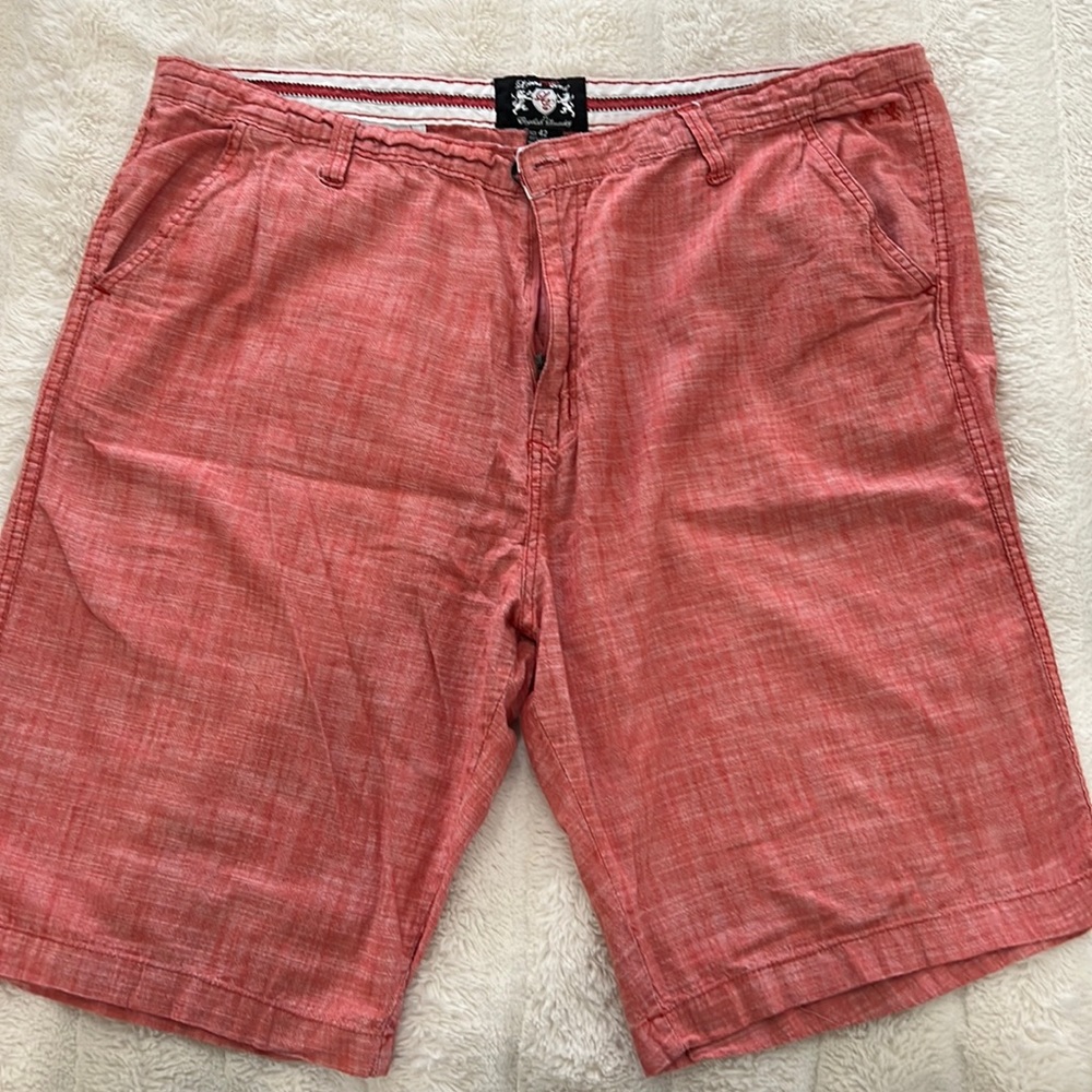 Mens lion crest shorts.